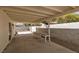 Covered patio with bench, creating a cozy outdoor relaxation area at 317 Brent Ct, Henderson, NV 89074