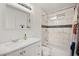 Clean bathroom with tile shower and tub, marble countertops, and ample lighting at 3208 Alcoa Ave, Las Vegas, NV 89102