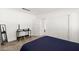Comfortable bedroom featuring plush carpeting, soft lighting, and a work space at 3208 Alcoa Ave, Las Vegas, NV 89102