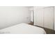 Bedroom with a large closet and white sliding doors, next to the bed at 3208 Alcoa Ave, Las Vegas, NV 89102