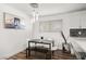 Cozy dining area featuring modern table set, hardwood floors and decoratives at 3208 Alcoa Ave, Las Vegas, NV 89102