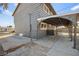 The home's backyard is complete with a chain link fence, and covered patio at 3208 Alcoa Ave, Las Vegas, NV 89102