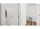 Bright hallway with white doors, tile flooring, and access to multiple rooms at 3208 Alcoa Ave, Las Vegas, NV 89102
