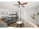 Open living space showing hardwood floors, modern seating, and white walls at 3208 Alcoa Ave, Las Vegas, NV 89102