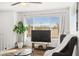 Well-lit living room features hardwood floors, window and modern furnishings at 3208 Alcoa Ave, Las Vegas, NV 89102