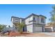 Charming two-story home with a well-maintained front yard and an attached two-car garage at 3871 Trellis View Ave, Las Vegas, NV 89115