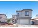Charming two-story home with a well-maintained front yard and an attached two-car garage at 3871 Trellis View Ave, Las Vegas, NV 89115
