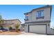 Charming two-story home with a well-maintained front yard and an attached two-car garage at 3871 Trellis View Ave, Las Vegas, NV 89115