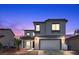 Charming two-story home with a well-maintained front yard and an attached two-car garage at 3871 Trellis View Ave, Las Vegas, NV 89115