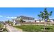 Beautiful home exterior showcasing lush greenery and pedestrian walkways at 4145 Nopal Serrano Ave, Las Vegas, NV 89141
