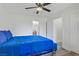 This bedroom features white walls, a ceiling fan, and convenient access to the bathroom and other rooms at 4200 S Valley View Blvd # 1120, Las Vegas, NV 89103