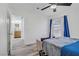 Bedroom with hardwood floors, natural light, and modern ceiling fan at 4200 S Valley View Blvd # 1120, Las Vegas, NV 89103