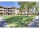 Apartment building with manicured lawns and trees, close to sidewalks at 4200 S Valley View Blvd # 1120, Las Vegas, NV 89103