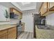 Well-lit kitchen features stainless steel appliances, granite countertops and hardwood floors at 4200 S Valley View Blvd # 1120, Las Vegas, NV 89103