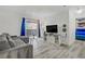 Living room features hardwood floors, bright natural light, and a view to the bedroom at 4200 S Valley View Blvd # 1120, Las Vegas, NV 89103