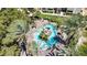 Aerial view of a luxurious community pool surrounded by palm trees at 4200 S Valley View Blvd # 1120, Las Vegas, NV 89103