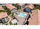 Aerial view of a community pool, surrounded by brick and lounge chairs at 4200 S Valley View Blvd # 1120, Las Vegas, NV 89103