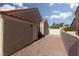 Backyard with gravel, siding, and a gate at 426 Lost Trail Dr, Henderson, NV 89014