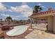 Spacious backyard with patio, desert landscaping, and city views at 426 Lost Trail Dr, Henderson, NV 89014