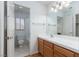 Bathroom featuring a vanity, mirror, and shower/tub combination at 426 Lost Trail Dr, Henderson, NV 89014