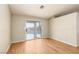 Bedroom with wood flooring and sliding glass doors leading to the outdoor pool at 426 Lost Trail Dr, Henderson, NV 89014