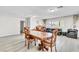 Spacious dining area with plenty of natural light and ample space for entertaining guests at 465 E Robindale Rd, Las Vegas, NV 89123