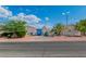 Charming single-story home featuring desert landscaping, a private drive, and serene curb appeal at 465 E Robindale Rd, Las Vegas, NV 89123