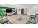 A stylish living room with couches, patterned console table, and modern decorations at 465 E Robindale Rd, Las Vegas, NV 89123