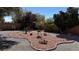 Desert landscaped backyard featuring decorative rock, cacti, and a serene outdoor space at 4732 S Adriano Way, Pahrump, NV 89061
