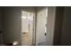 Well-lit bathroom featuring a tub with tiled surround and neutral color palette at 4732 S Adriano Way, Pahrump, NV 89061