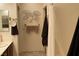 Well-lit bathroom with decorative towel arrangement and a stand up shower at 4732 S Adriano Way, Pahrump, NV 89061