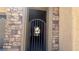 Elegant metal gate featuring a unique floral design detail at the entrance at 4732 S Adriano Way, Pahrump, NV 89061