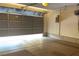 Spacious two-car garage featuring a clean concrete floor and an automatic door at 4732 S Adriano Way, Pahrump, NV 89061