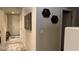 Hallway featuring neutral walls, stylish decor, and access to rooms at 4732 S Adriano Way, Pahrump, NV 89061