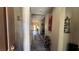 Inviting hallway with stylish wood-look flooring and decorative wall accents at 4732 S Adriano Way, Pahrump, NV 89061