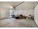 Spacious garage featuring a washer, dryer, and couch at 4841 Raw Umber Ct, Las Vegas, NV 89131