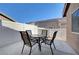 Backyard patio featuring a table and four chairs at 4841 Raw Umber Ct, Las Vegas, NV 89131
