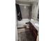 Well-maintained bathroom with shower-tub combo, updated vanity, and modern flooring at 5000 Indian River Dr # 483, Las Vegas, NV 89103