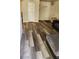 Entryway leading to the open living room with modern plank flooring at 5000 Indian River Dr # 483, Las Vegas, NV 89103