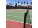 A community tennis court featuring a vibrant playing surface and well-maintained net at 5000 Indian River Dr # 483, Las Vegas, NV 89103