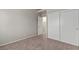 Bedroom features a sliding closet and neutral-toned walls at 5042 S Rainbow Blvd # 206, Las Vegas, NV 89118