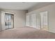 Large bedroom boasting balcony access, closet and ensuite bath at 5042 S Rainbow Blvd # 206, Las Vegas, NV 89118