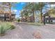 Well-maintained common area with mature trees and desert landscaping at 5042 S Rainbow Blvd # 206, Las Vegas, NV 89118