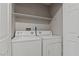 Bright laundry area equipped with a washer and dryer at 5042 S Rainbow Blvd # 206, Las Vegas, NV 89118