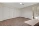 Neutral bedroom featuring plush carpeting and closet with sliding doors at 5161 Lindell Rd # 206, Las Vegas, NV 89118