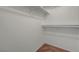 Walk-in closet with carpet flooring and white shelving for optimal storage at 5161 Lindell Rd # 206, Las Vegas, NV 89118