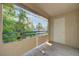 Relaxing covered patio boasting serene outdoor views and natural light at 5161 Lindell Rd # 206, Las Vegas, NV 89118