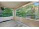 Covered patio overlooking lush landscaping and mature trees at 5161 Lindell Rd # 206, Las Vegas, NV 89118