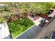 An inviting backyard featuring lush artificial grass and a charming playhouse at 5568 Table Top Ln, Las Vegas, NV 89135