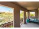 Inviting balcony with outdoor seating and view at 5568 Table Top Ln, Las Vegas, NV 89135